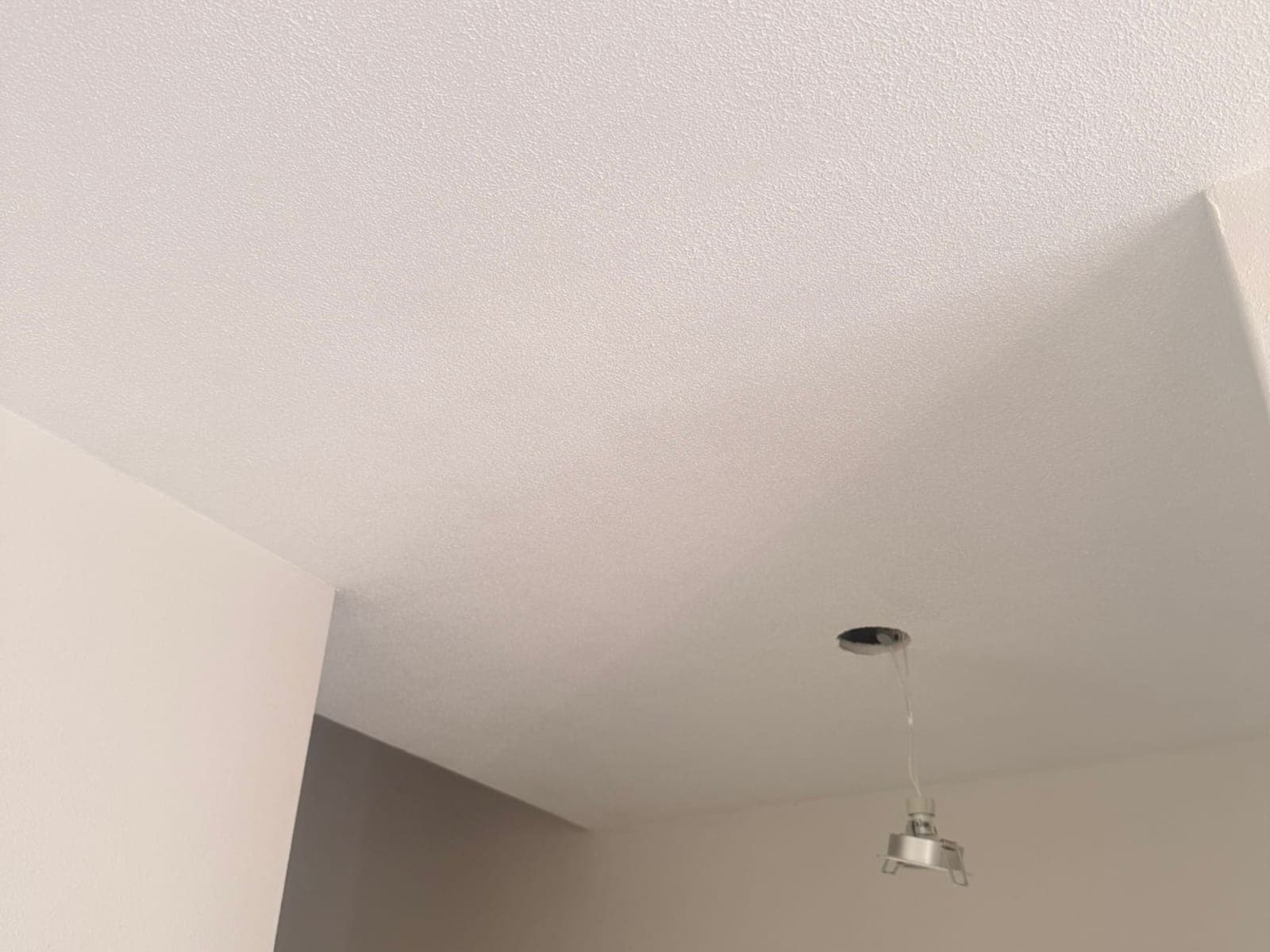 Na: Plafond hersteld na een lekkage